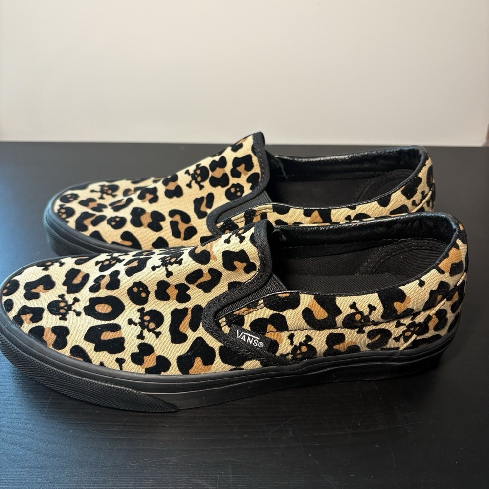 Vans Unisex Classic Slip On Canvas Skate Shoe - Leopard/Skulls/Black Women's 8.5